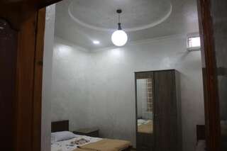 Гостевой дом Guest House On Asatiani Батуми Четырехместный номер с собственной ванной комнатой-7